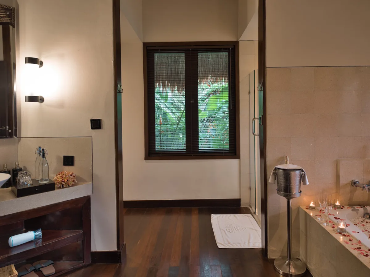 Jungle View Villa bathroom with romantic flower bath setup and vanity in Ubud, Bali