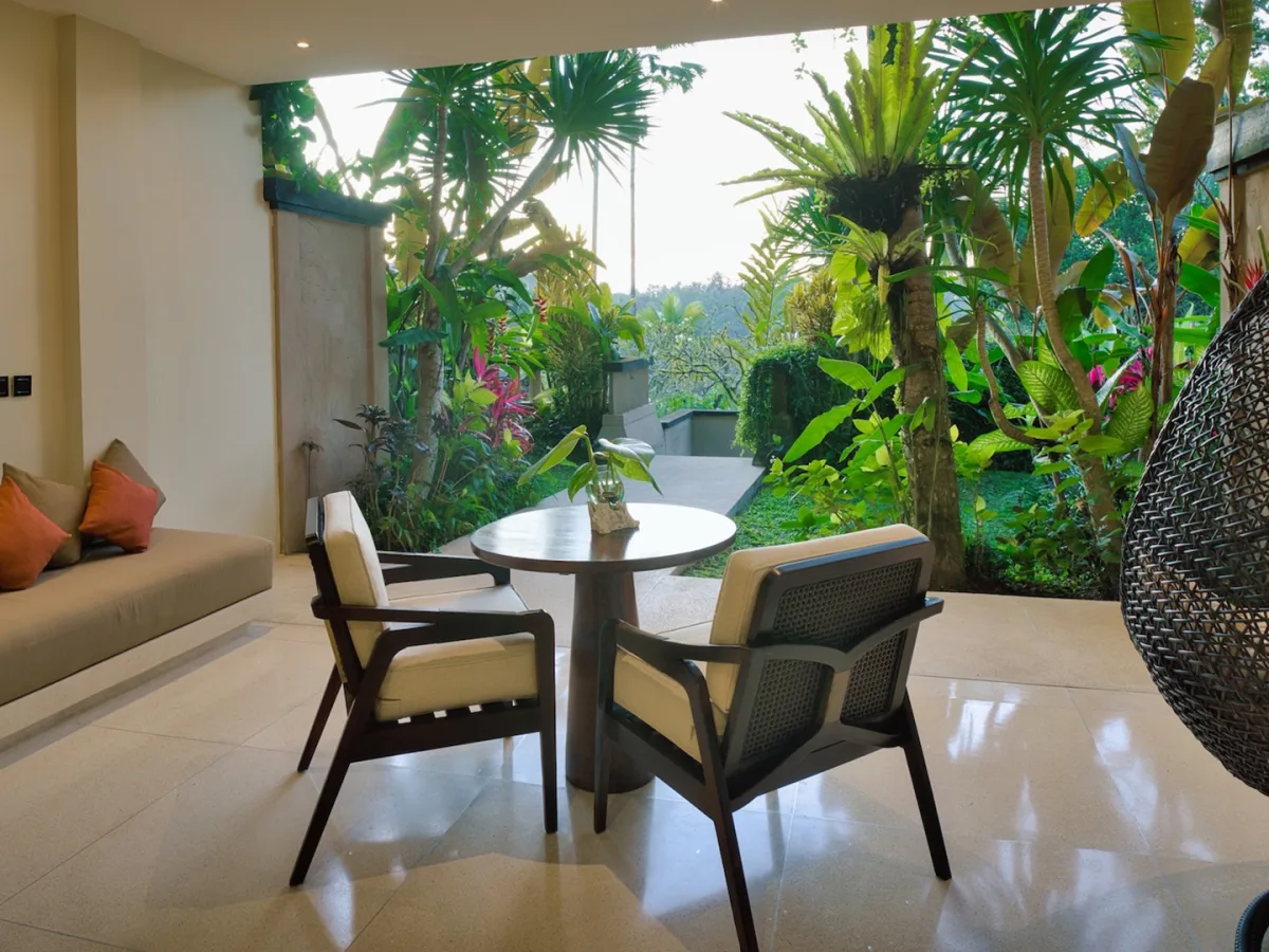 Private Garden Royal Suite living area with tropical garden views at Nandini Jungle by Hanging Gardens in Ubud, Bali