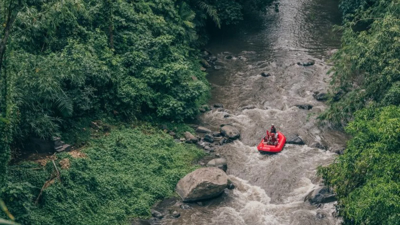 Guests rafting through white water on the Ayung River near Nandini Jungle by Hanging Gardens in Bali